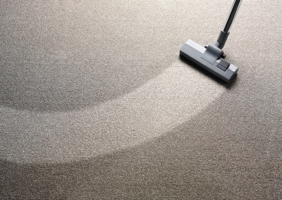 Vacuum Ceaning a Carpet
